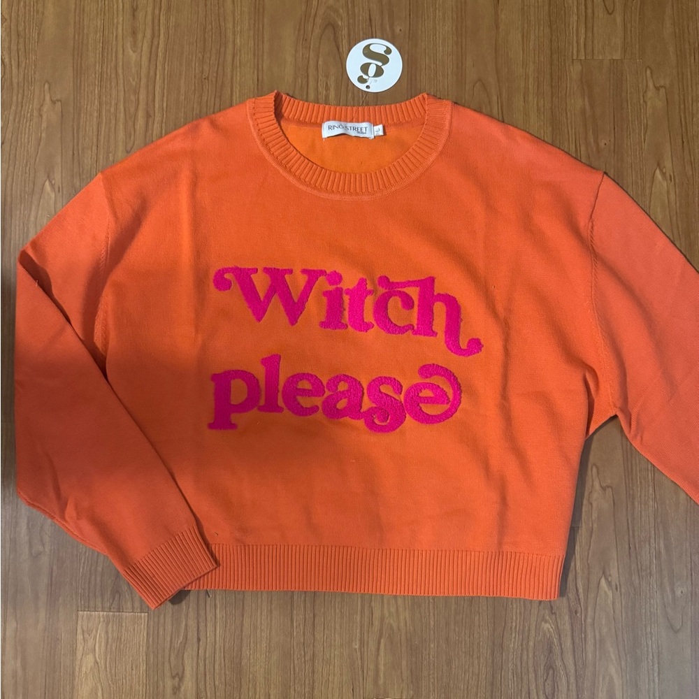 Playful Orange Crew Neck Sweater with Pink Text, perfect for Halloween